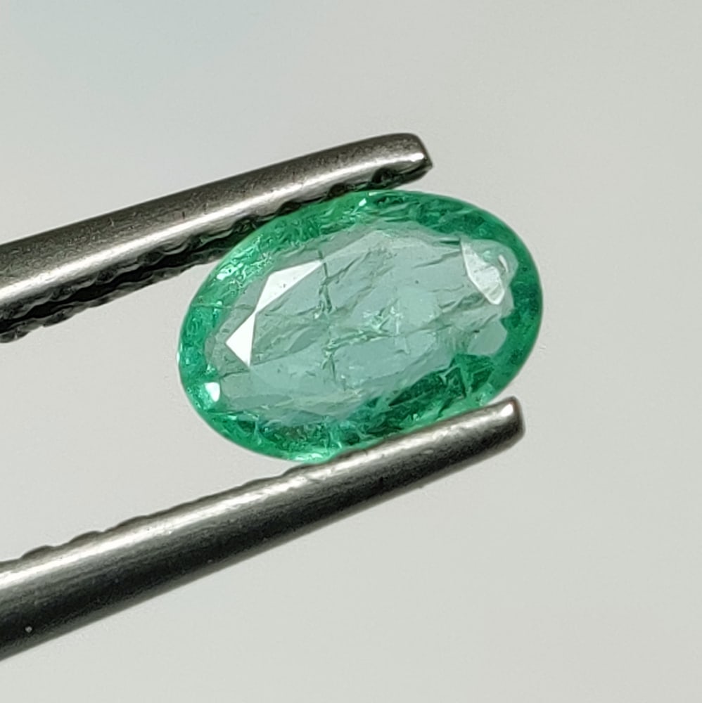 0.47 Ct Natural Zambian Green Emerald Oval Cut: Weight - 0.47 Ct / Size - 6.50 x 4.60 x 2.30 mm / Shape - Oval Cut / Color - Green / Clarity - SI / Origin - Zambia / Treatment - Natural Emeralds are commonly enhanced by oil