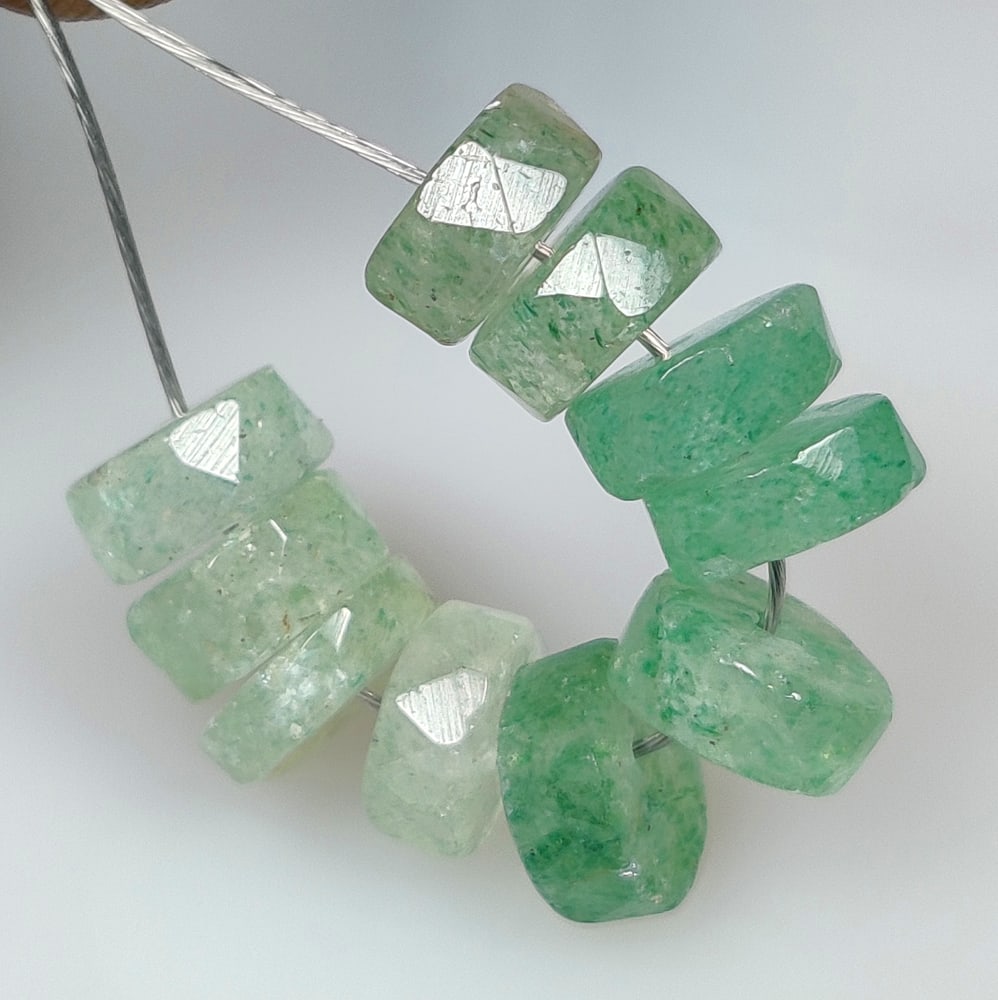 13.32 Ct Natural Aventurine Round Cut Beads: Weight - 13.32 Ct / Dimensions - 6.60 - 7.60 mm / 10 Pc's / Shape - Round Beads / Color - Blue / Clarity - Transparent / Origin - Brazil / Treatment - None