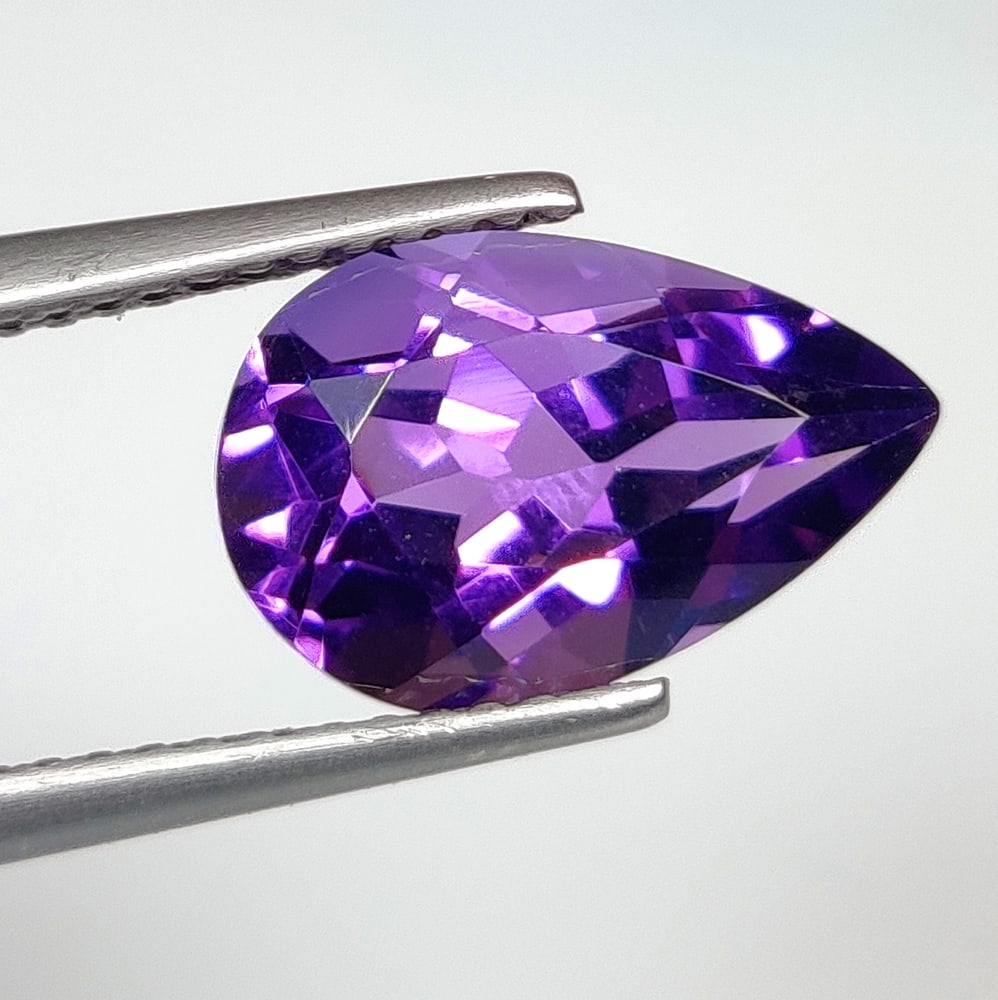 3.07 Ct Natural Purple Amethyst Pear Cut: Weight - 3.07 Ct / Size - 12.20 x 8.00 x 6.60 mm / Shape - Pear Cut / Color - Purple / Clarity - VVS / Origin -Brazil / Treatment - Heated