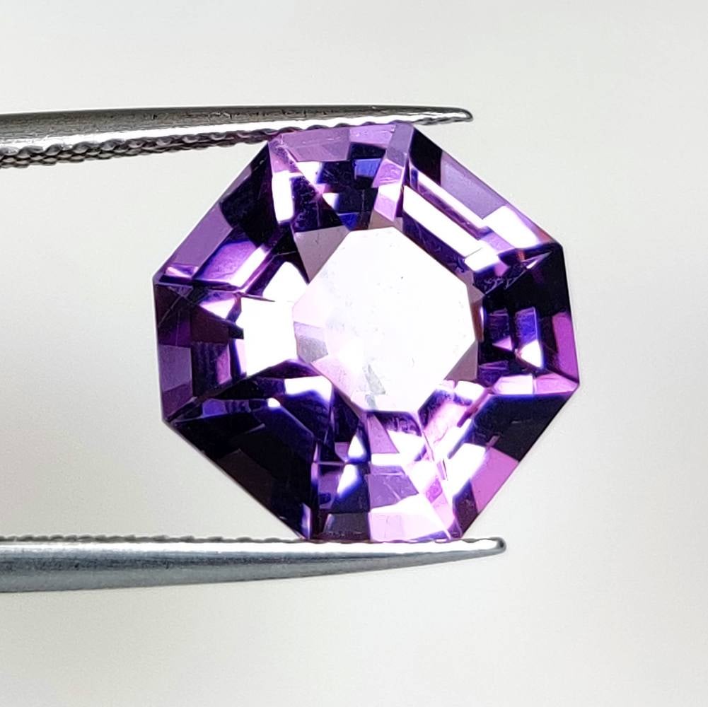 6.96 Ct Natural Purple Amethyst Asscher Cut: Weight - 6.96 Ct / Size - 12.90 x 12.90 x 8.70 mm / Shape - Asscher Cut / Color - Purple / Clarity - VVS / Origin -Brazil / Treatment - Heated