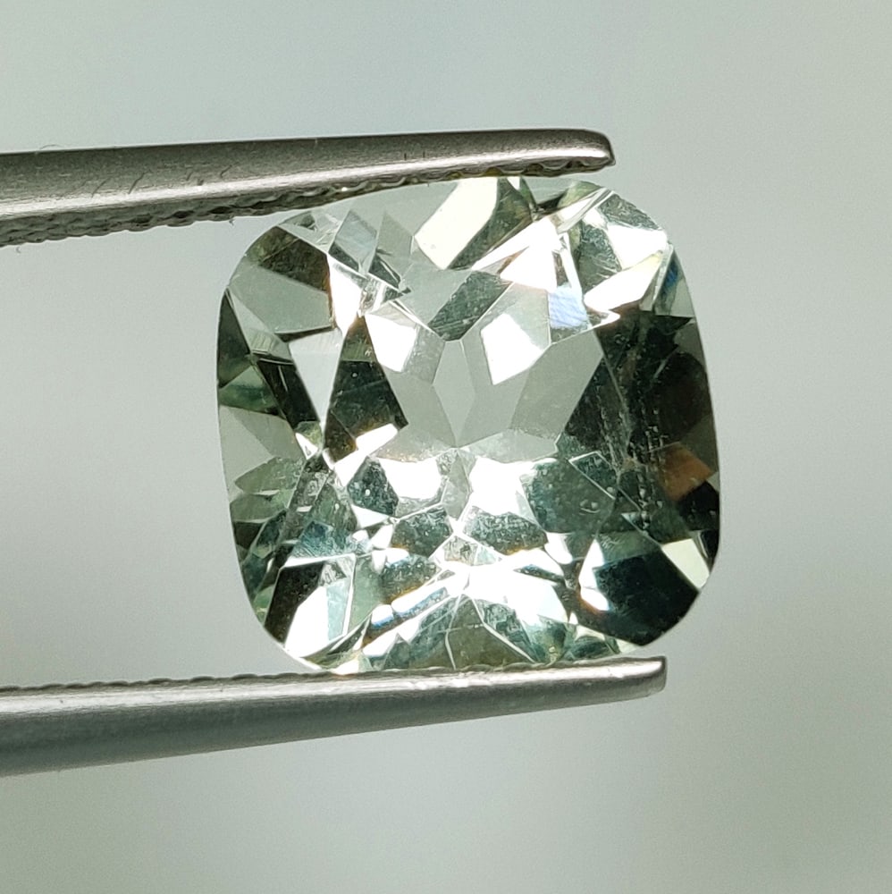 4.13 Ct Natural Green Amethyst Cushion Cut: Weight - 4.13 Ct / Size - 10.10 x 10.10 x 7.00 mm / Shape - Cushion Cut / Color - Green / Clarity - VVS / Origin - Brazil / Treatment - heated