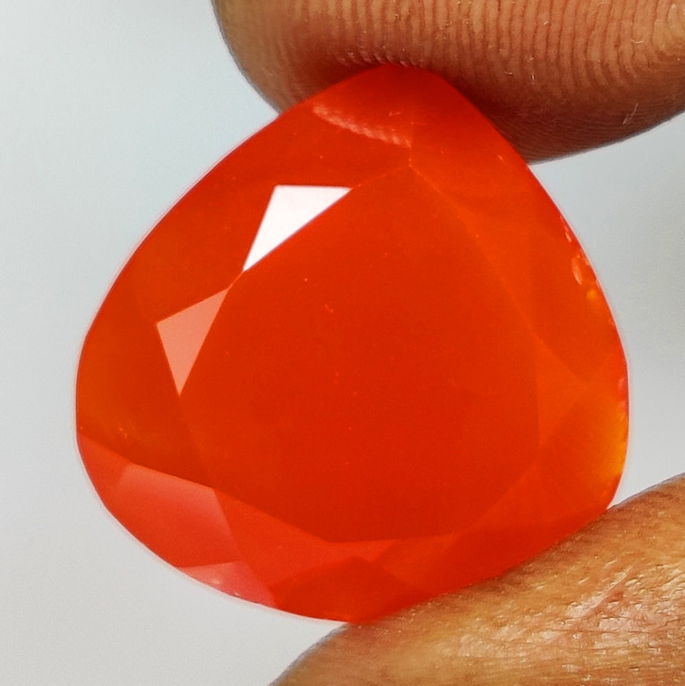 10.60 Ct Natural Orange Carnelian Pear Cut: Weight - 10.60 Ct / Size - 16.80 x 16.50 x 6.90 mm / Shape - Pear Cut / Clarity - Semi - Opaque / Origin - Brazil