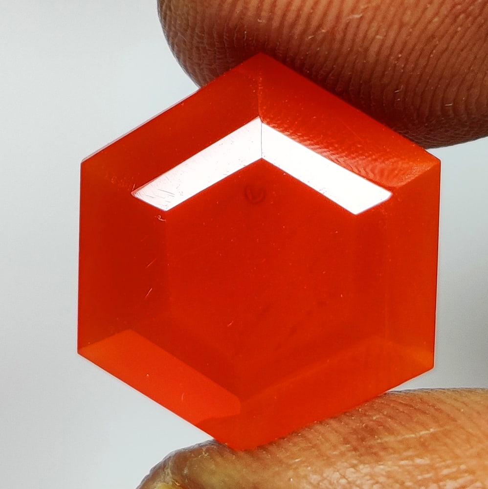 8.57 Ct Natural Orange Carnelian Hexagon Cut: Weight - 8.57 Ct / Size - 15.80 x 13.90 x 7.20 mm / Shape - Hexagon Cut / Clarity - Semi - Opaque / Origin - Brazil