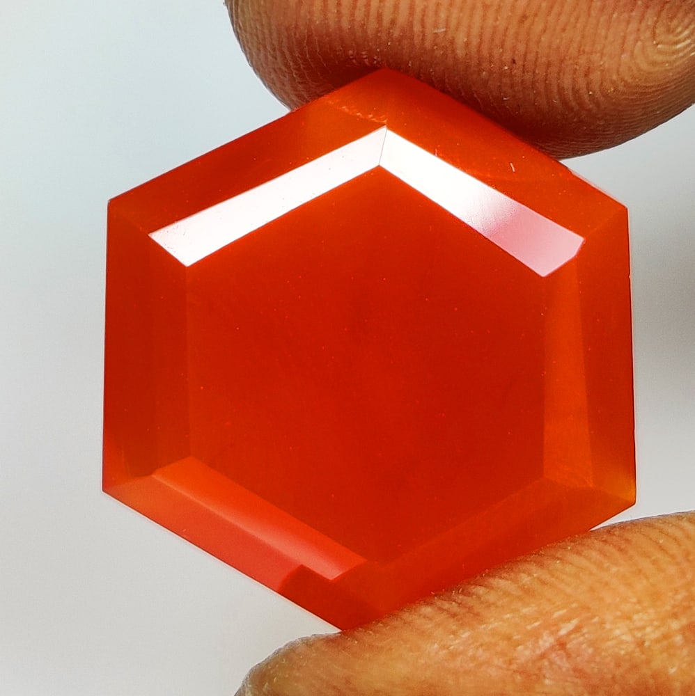 14.79 Ct Natural Orange Carnelian Hexagon Cut: Weight - 14.79 Ct / Size - 19.40 x 17.20 x 7.70 mm / Shape - Hexagon Cut / Clarity - Semi - Opaque / Origin - Brazil