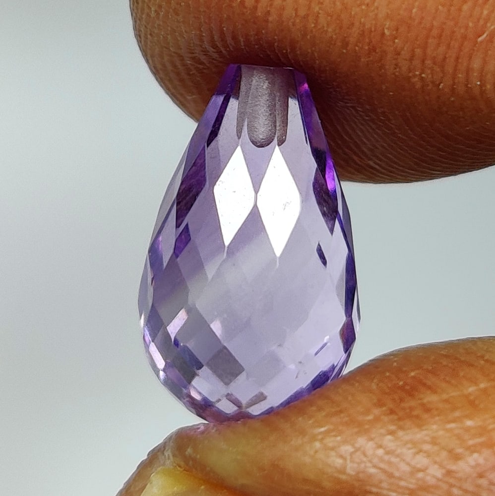 3.86 Ct Natural Purple Amethyst Pear Drop Beads: Weight - 3.86 Ct / Size - 12.10 x 7.10 x 7.10 mm / Shape - Pear Drop Beads / Color - Purple / Clarity - VVS / Origin -Brazil / Treatment - Heated