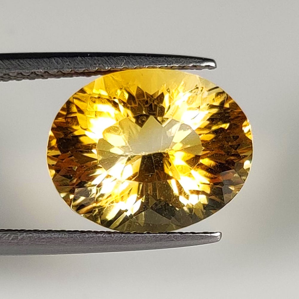 6.81 Ct Natural Yellow Citrine Oval Cut: Weight - 6.81 Ct / Dimensions -13.50 x 11.00 x 8.50 mm / Shape - Oval Cut / Color - Yellow / Clarity - VVS / Origin - Brazil / Treatment - Heated
