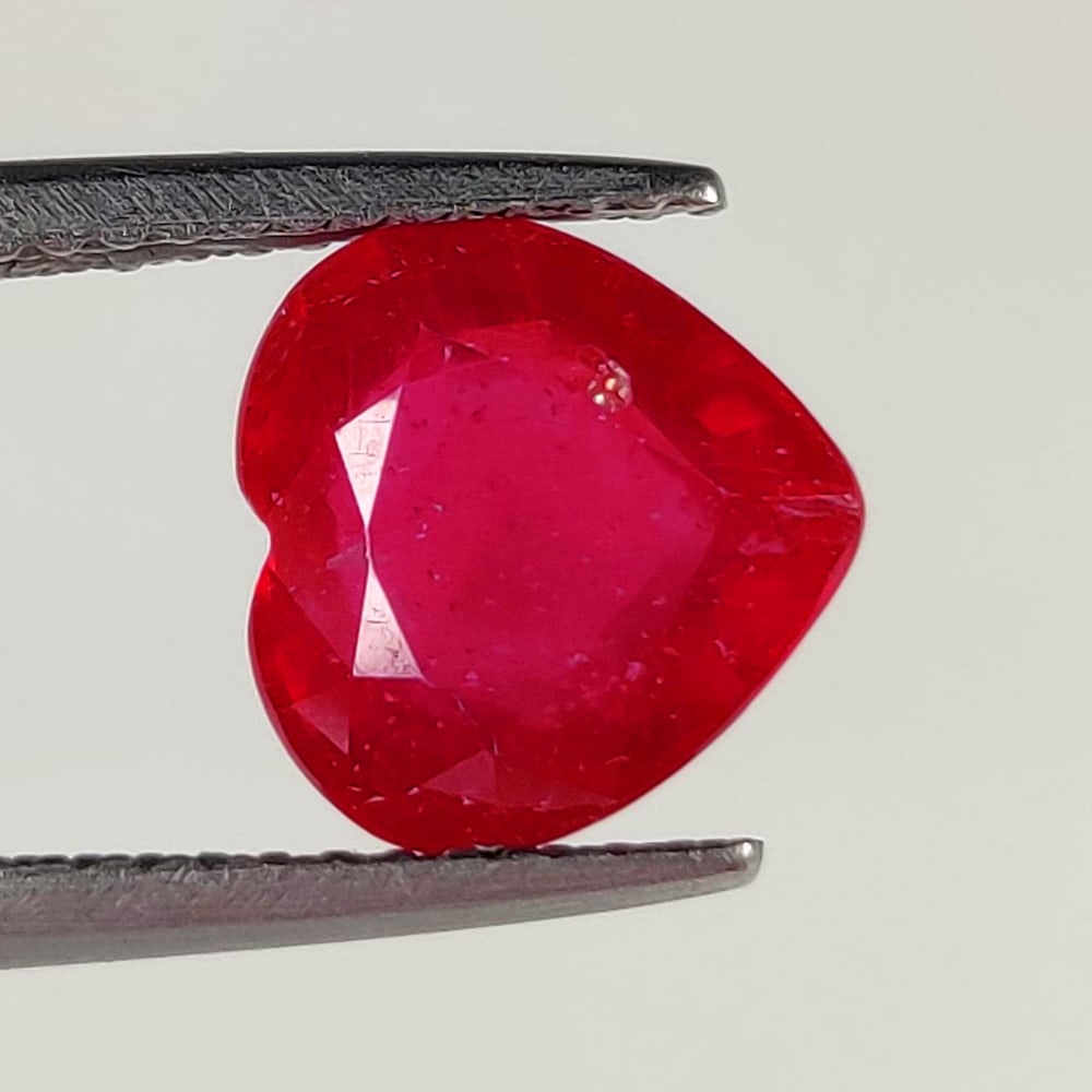 3.26 Ct Natural Pinkish Red Ruby Heart Cut: Weight - 3.26 Ct / Dimensions - 9.30 x 9.00 x 5.00 mm / Shape - Heart Cut / Color - Red / Clarity - VS / Origin - Mozambique / Treatment - Color enhanced by glass filling