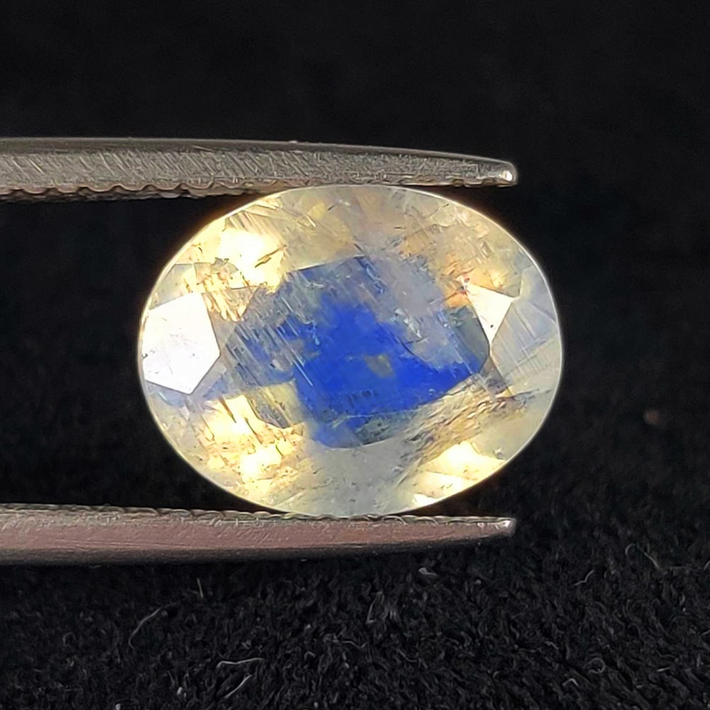 2.93 Ct Natural Blue Tint Moonstone Oval Cut: Weight - 2.93 Ct / Dimensions - 11.00 x 9.00 x 5.00 mm / Shape - Oval Cut / Clarity - Semi-Transparent / Origin - India / Comments - None