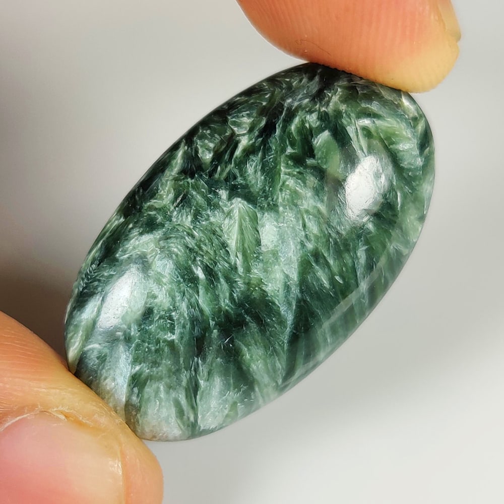26.51 Ct Natural Serphinite Oval Cab (1 of 2)