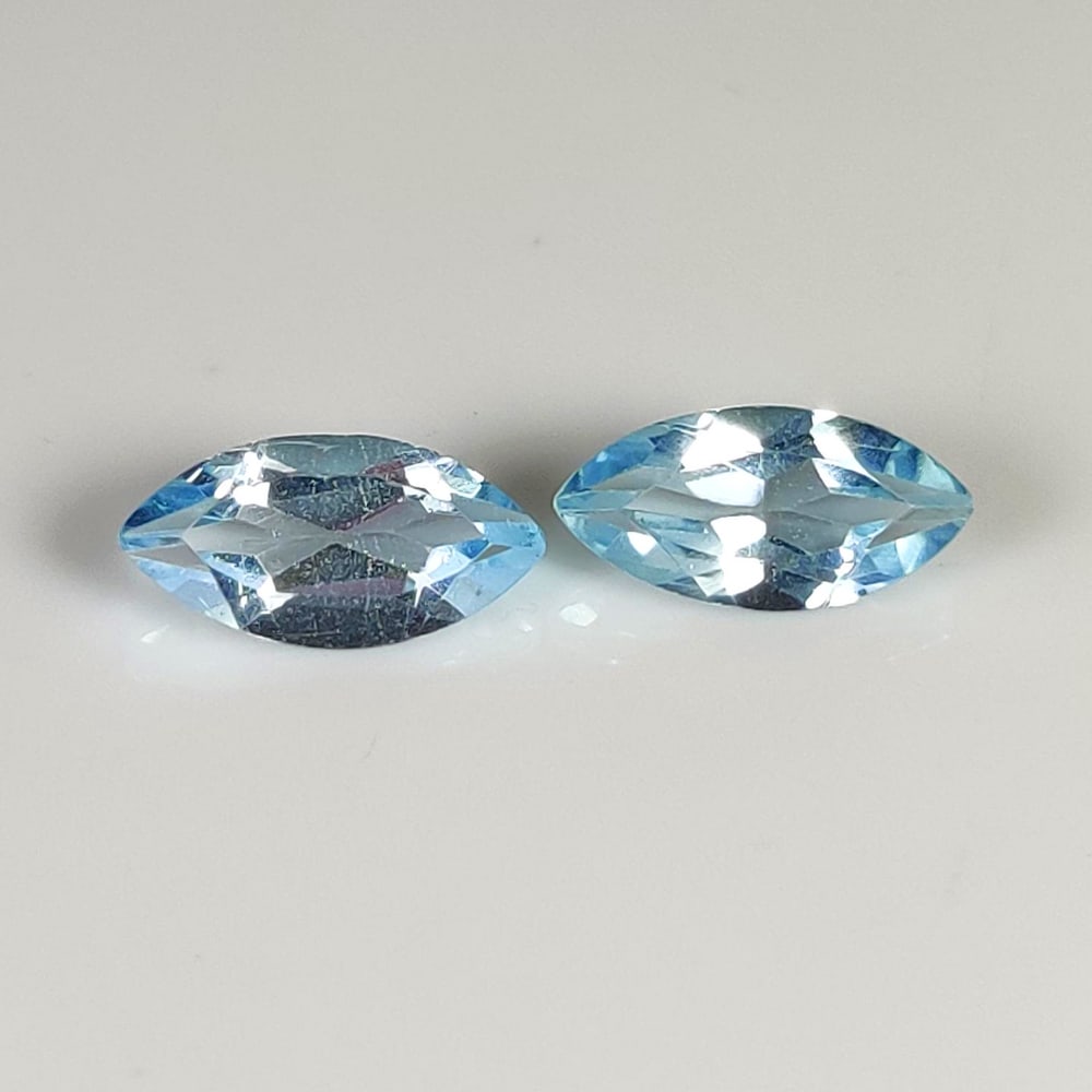 2.43 Ct Natural Blue Topaz Marquise Cut Pair: Weight - 2.43 Ct / Dimensions - 10.00 x 5.00 x 3.50 mm / 2 PC's / Shape - Marquise Cut / Color - Blue / Clarity - VVS / Origin - Brazil / Treatment - Irradiated