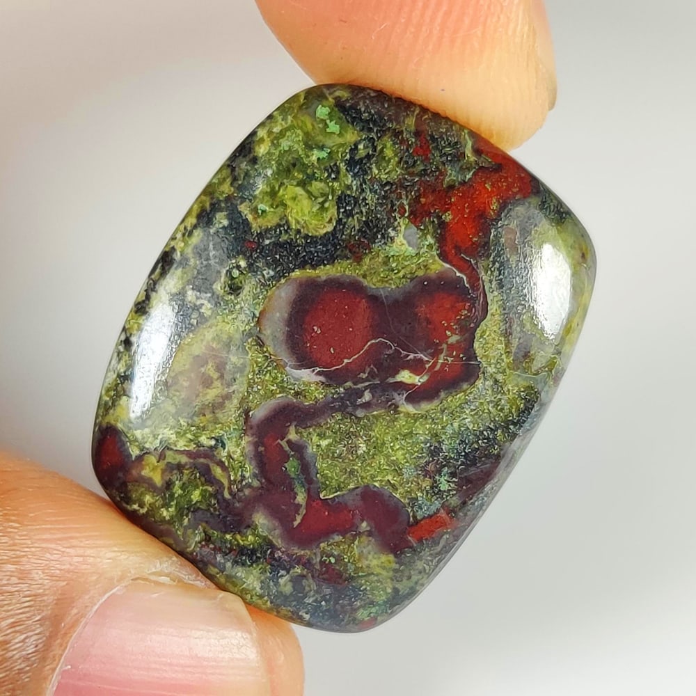 29.25 Ct Natural Green Candy Jasper Quartz Cushion Cab: Weight - 29.25 Ct / Size - 25.00 x 20.00 x 5.50 mm / Shape - Cushion Cab / Clarity - Opaque / Origin - Brazil / Treatment - None