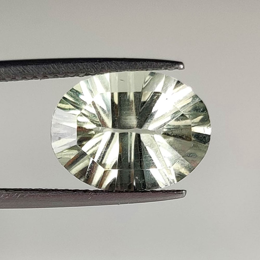5.05 Ct Natural Green Amethyst Oval Laser cut: Weight - 5.05 Ct / Dimensions - 13.00 x 10.00 x 6.50 mm / Shape - Oval Laser Cut / Color - Green / Clarity - VVS / Origin - Brazil / Treatment - Heated