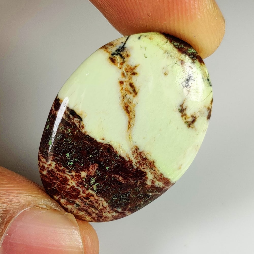 23.40 Ct Natural Lemon Chrysoprase Oval Cab: Weight - 23.40 Ct / Dimensions - 29.00 x 20.20 x 5.00 mm / Shape - Oval Cab / Transparency - Semi-Transparent / Origin - Brazil / Treatment - None