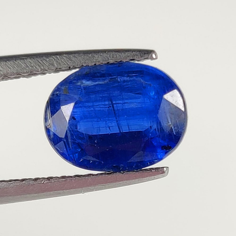 2.43 Ct Natural Blue Kyanite Oval Cut: Weight - 2.43 Ct / Size - 9.00 x 7.00 x 4.20 mm / Shape - Oval Cut / Color - Blue / Clarity - SI / Origin - India / Treatment - None