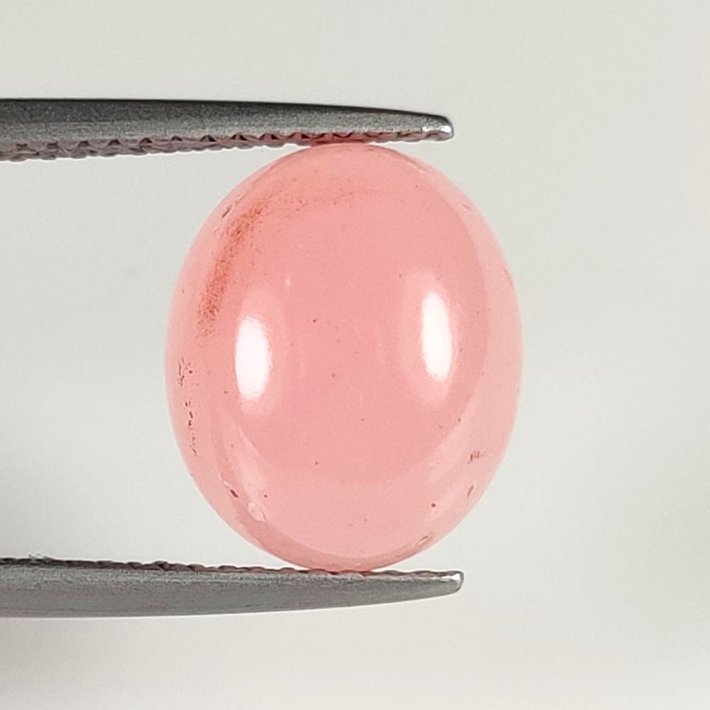 3.00 Ct Natural Pink Opal Oval Cab: Weight - 3.00 Ct / Dimensions - 12.00 x 10.00 x 5.00 mm / Shape - Oval Cab / Clarity - Opaque / Origin - Peru / Treatment - None