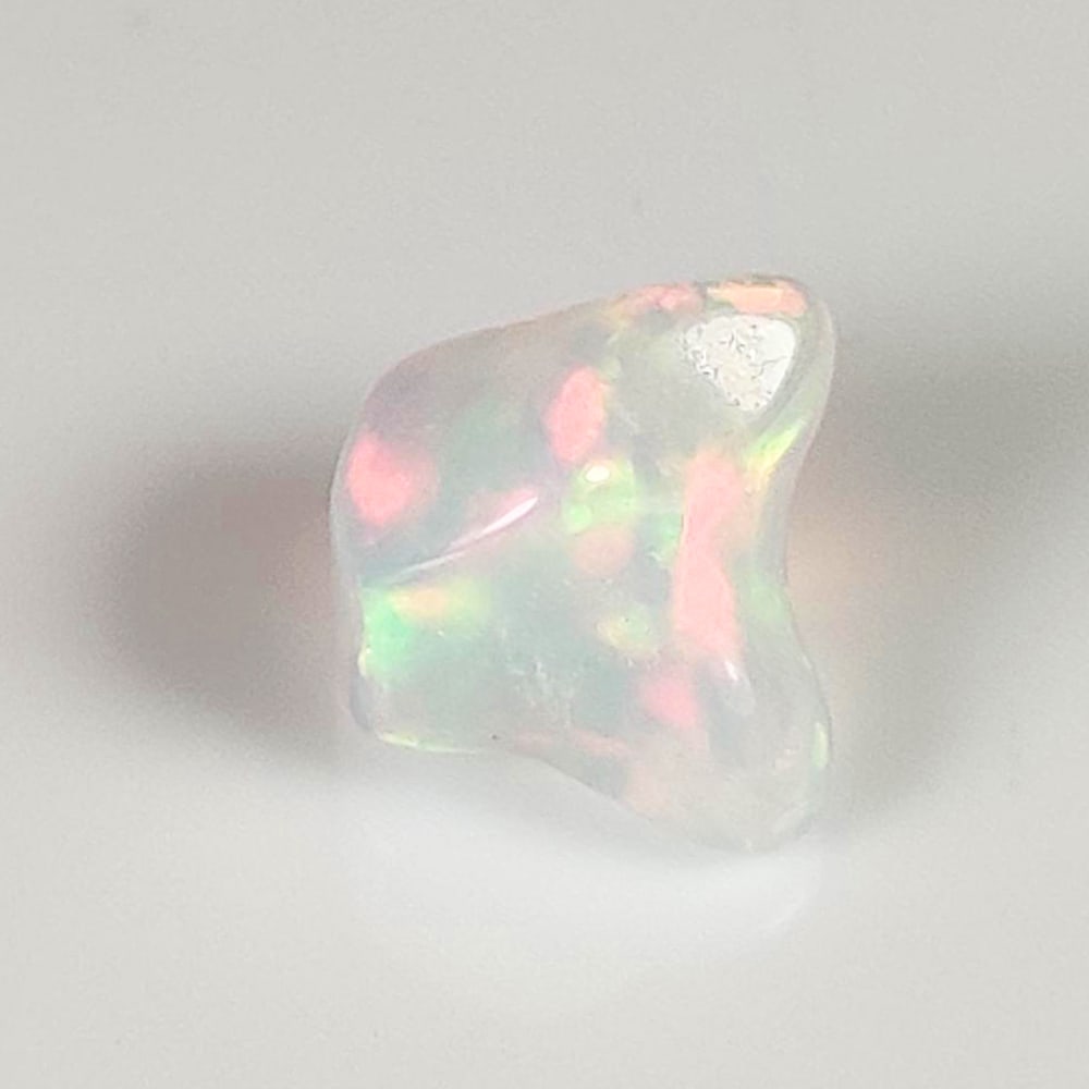 2.39 Ct Natural Multicolor Top Fire Opal Solid Rough Cab: Weight - 2.39 Ct / Dimensions - 9.50 x 8.80 x 8.80 mm / Shape - Unshaped Solid Cab / Color - Multicolor / Clarity - Translucent / Origin - Ethiopia / Treatment - None