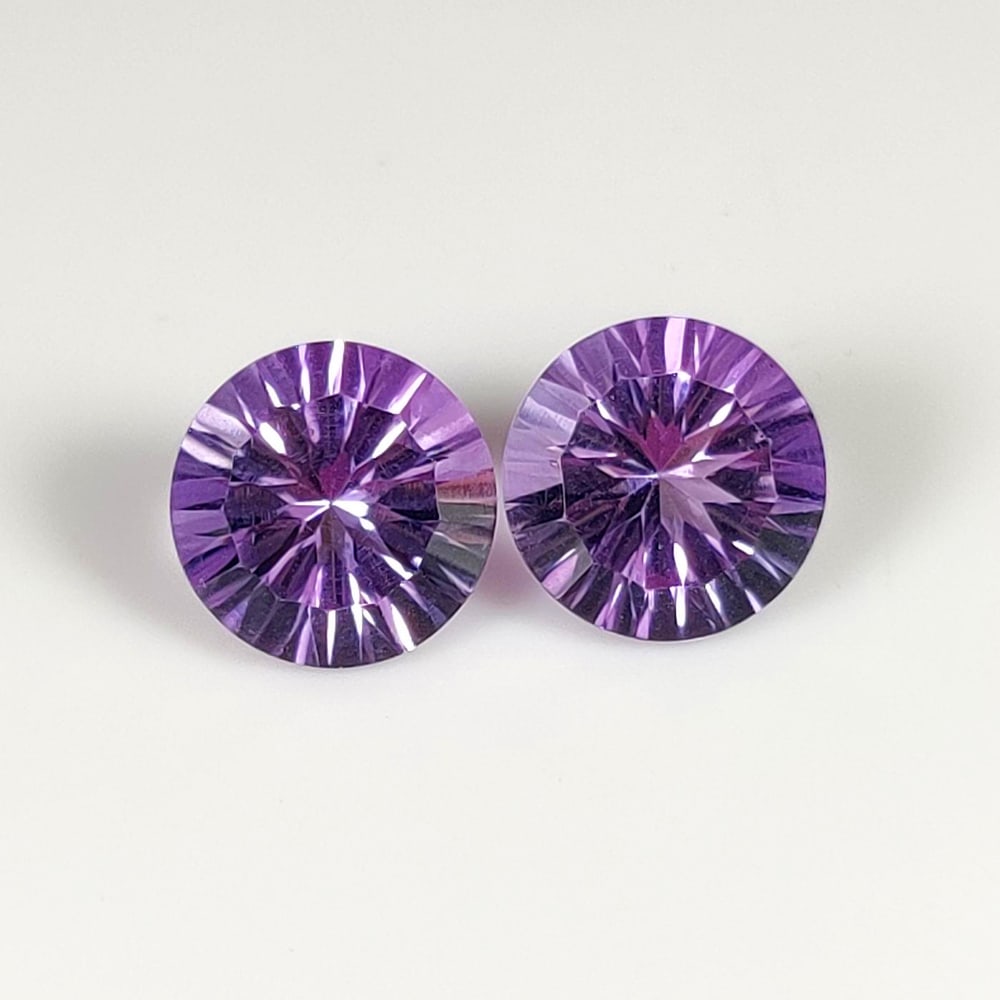 4.58 Ct Natural Purple Amethyst Round Cut Pair: Weight - 4.58 Ct / Dimensions - 9.00 x 9.00 x 6.00 mm / 2 Pc's / Shape - Round Cut / Color - Purple / Clarity - VVS / Origin -Brazil / Treatment - Heated
