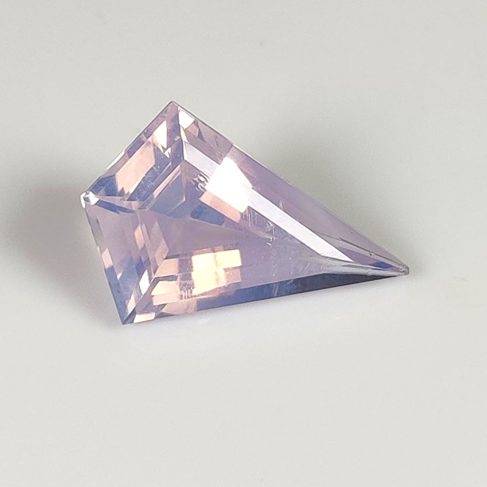 4.00 Ct Natural Lavender Amethyst Fancy Kite Cut: Weight : 4.00 Ct / Dimensions : 16.80 x 11.00 x 6.30 mm / Shape : Fancy Kite Cut / Color : Lavender / Transparency : Transparent / Treatment : Heated