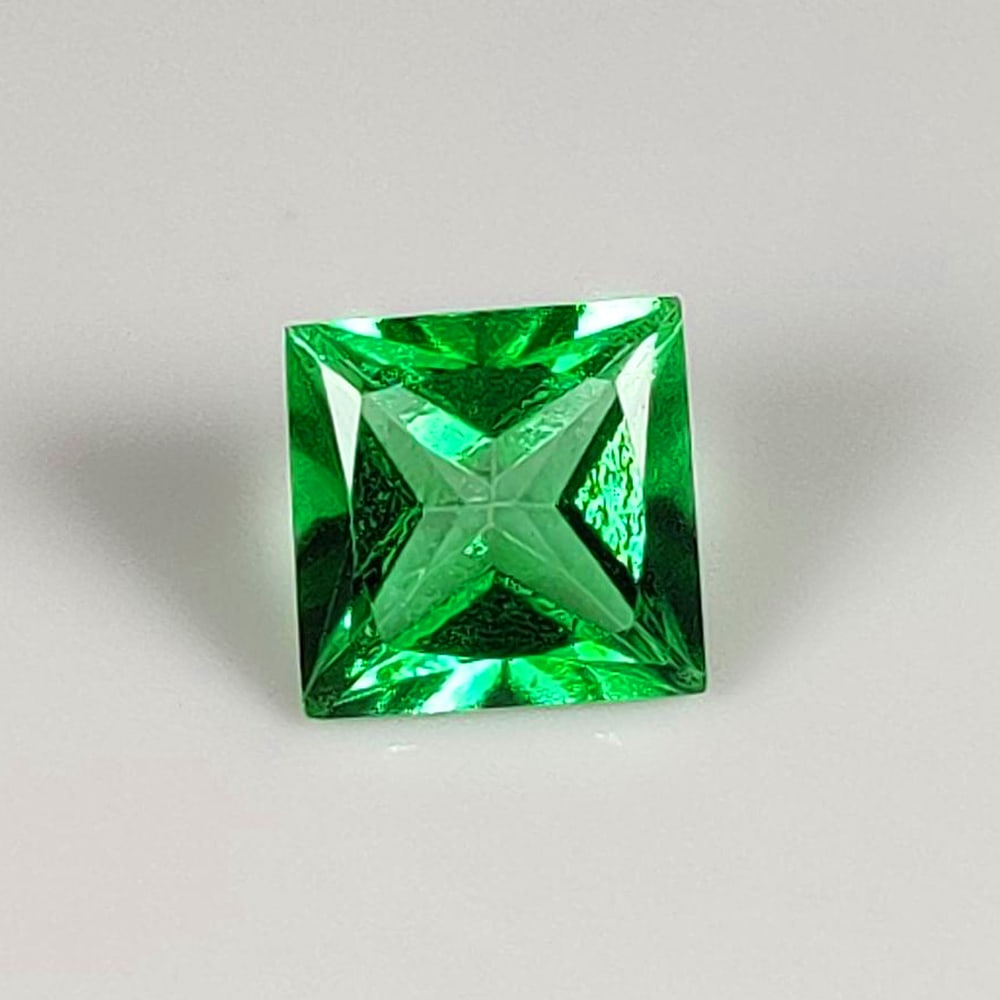 2.07 Ct Natural Green Topaz Square Cut: Weight - 2.07 Ct / Size - 7.30 x 7.30 x 5.80 mm / Shape - Square Cut / Color - Green / Clarity - VVS / Origin - Brazil / Treatment - Color Coated