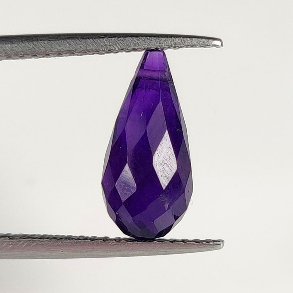 3.14 Ct Natural Purple Amethyst Pear Drop beads: Weight - 3.14 Ct / Dimensions - 13.20 x 6.40 x 6.40 mm / Shape -Pear Drop beads / Color - Purple / Clarity - VVS / Origin - Brazil / Treatment - Heated