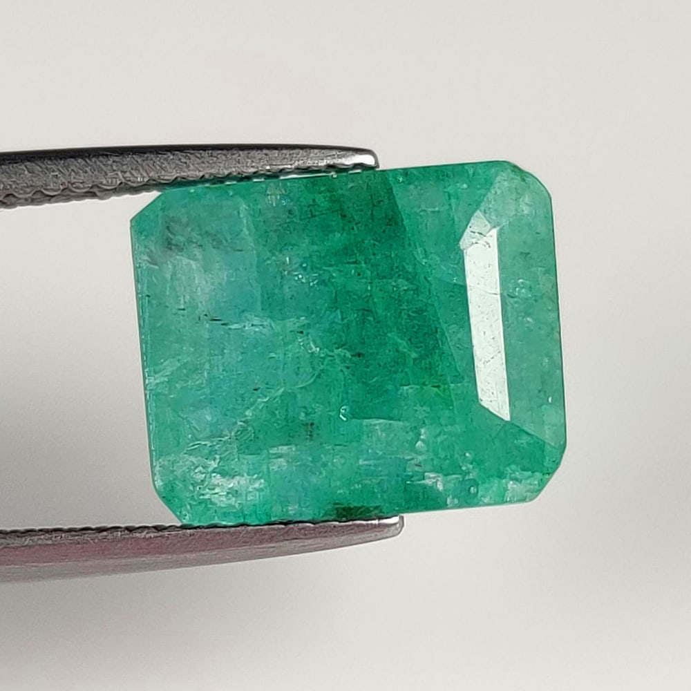 7.00 Ct Natural Green Emerald Emerald Cut: Weight - 7.00 Ct / Size - 13.30 x 10.90 x 6.10 mm / Shape - Emerald Cut / Color - Green / Clarity - SI / Origin - Zambia / Treatment - Color Coated