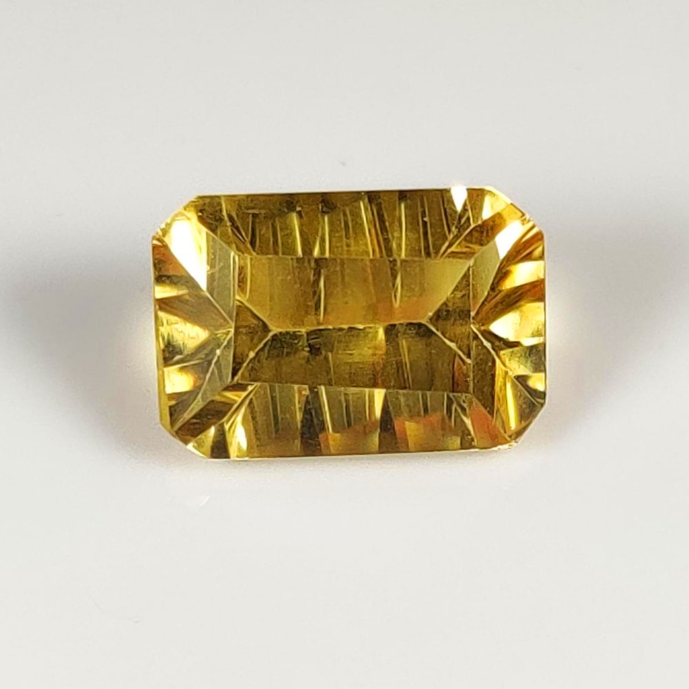 5.50 Ct Natural Yellow Citrine Cushion Cut: Weight - 5.50 Ct / Dimensions - 13.20 x 9.00 x 6.10 mm / Shape - Cushion Cut / Color - Yellow / Clarity - VVS / Origin - Brazil / Treatment - Heated