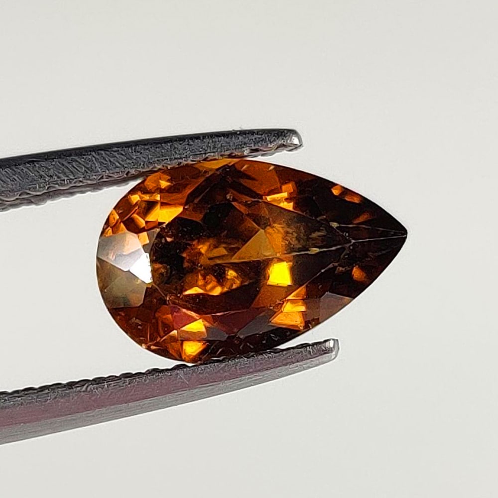 2.50 Ct Natural Brown Zircon Pear Cut: Weight - 2.50 Ct / Size - 9.90 x 6.40 x 4.40 mm / Shape - Pear Cut / Color - Brown / Clarity - VVS / Origin - Cambodia / Treatment - Gentle Heat