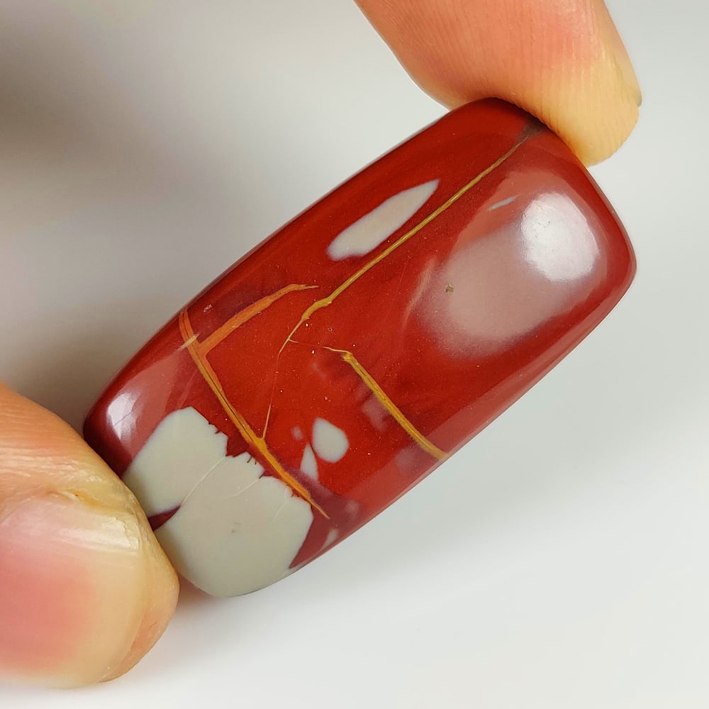 39.16 Ct Natural Bloodstone Jasper Quartz Cushion Cab: Weight - 39.16 Ct / Size - 35.00 x 18.00 x 6.20 mm / Shape - Cushion Cab / Clarity - Opaque / Origin - Brazil / Treatment - None