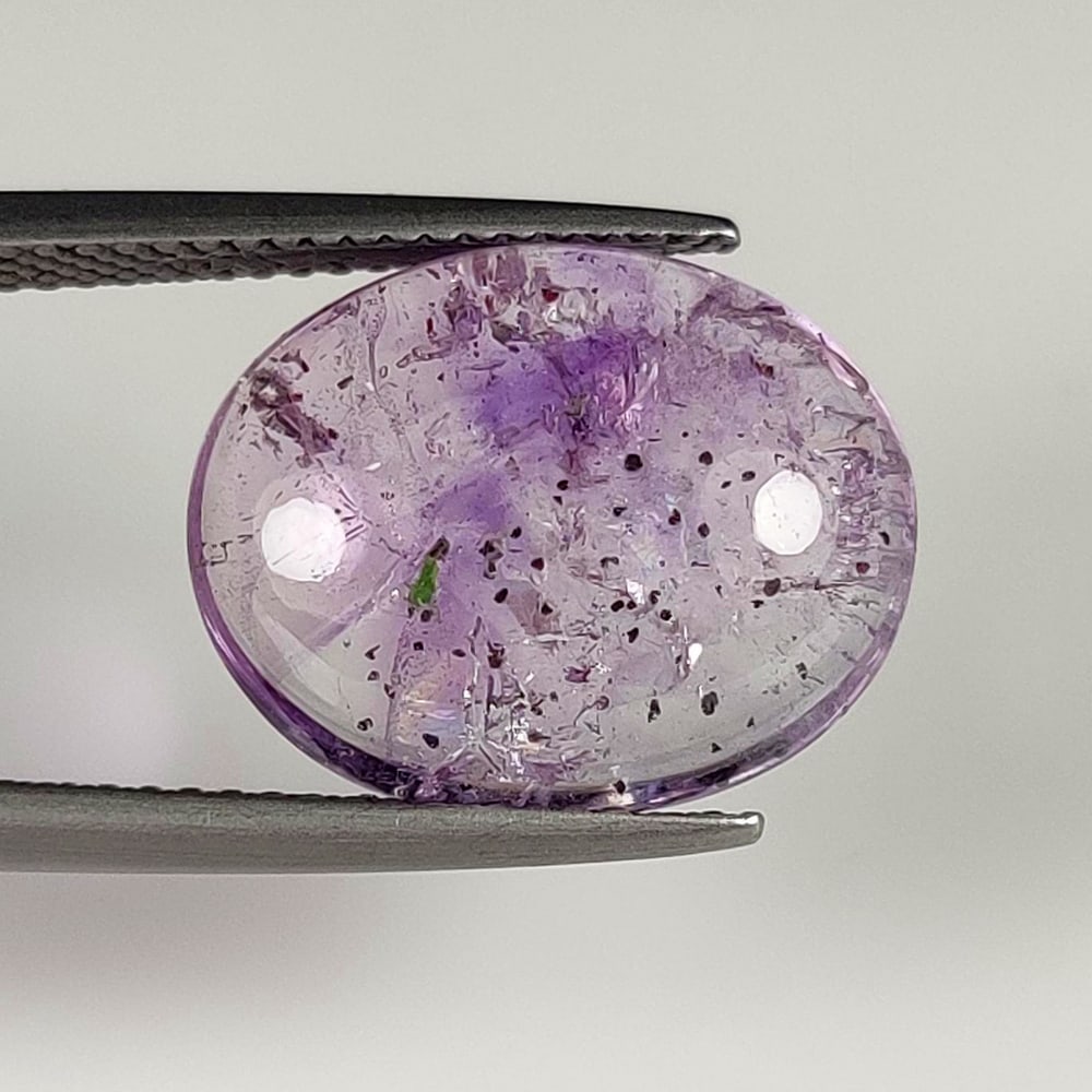 9.30 Ct Natural Rutile Amethyst Quartz Oval Cab: Weight - 9.30 Ct / Size - 16.00 x 12.70 x 6.50 mm / Shape - Oval Cab / Clarity - Transparent / Origin - Norway / Treatment - None