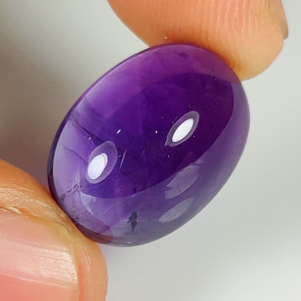 14.05 Ct Natural Rutile Amethyst Quartz Oval Cab: Weight - 14.05 Ct / Size - 18.00 x 17.50 x 8.30 mm / Shape - Oval Cab / Clarity - Transparent / Origin - Norway / Treatment - None