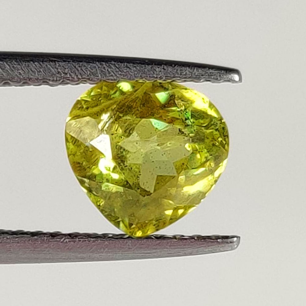1.54 Ct Natural Sphene Pear Cut: Weight - 1.54 Ct / Size - 7.50 x 7.00 x 4.00 mm / Shape - Pear Cut / Color - Deep Yellow / Clarity - SI / Origin - Myanmar / Treatment - None