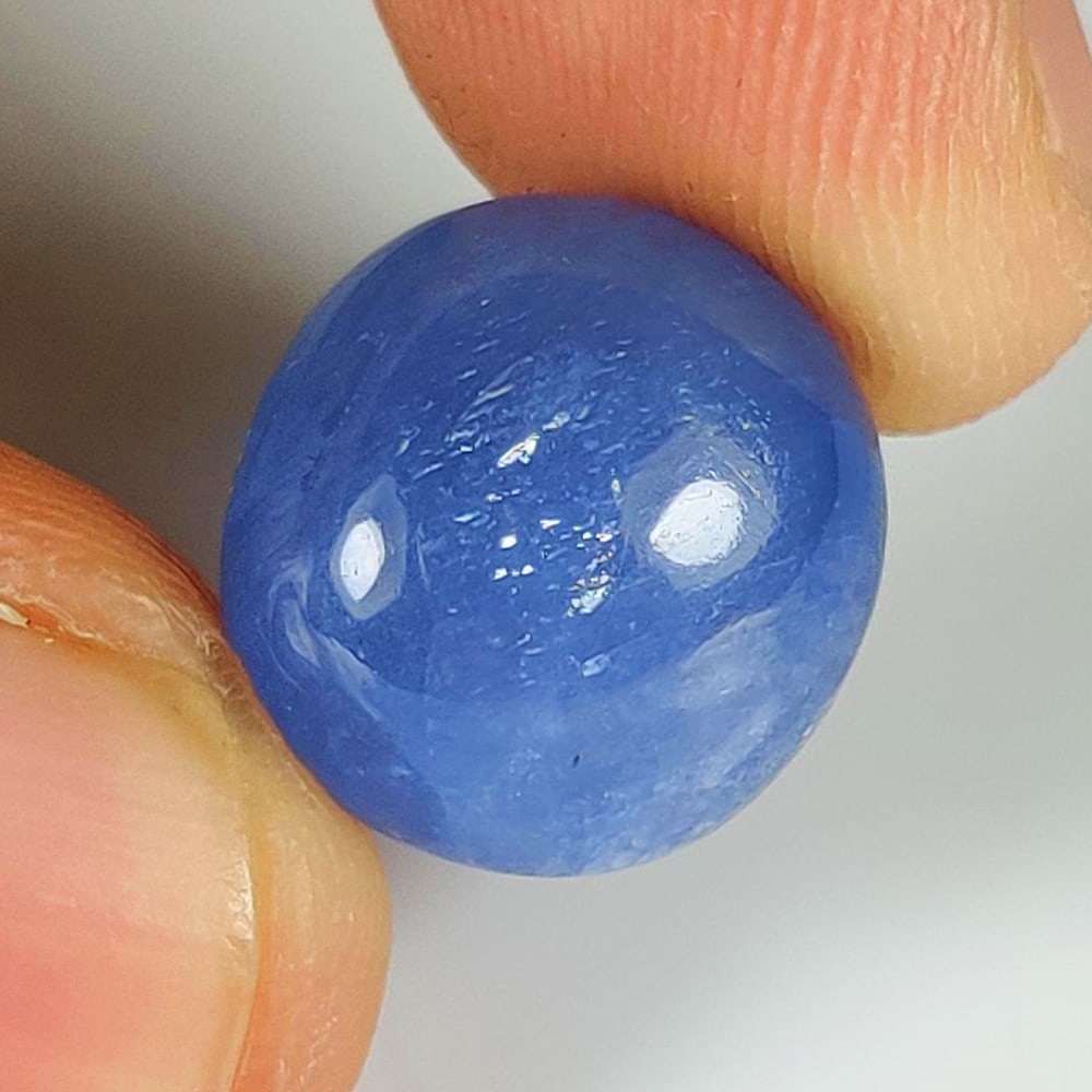 11.00 Ct Natural Blue Sapphire Round Cab: Weight - 11.00 Ct / Size- 13.00 x 12.80 x 9.00 mm / Shape - Round Cab / Clarity - Opaque / Origin - Sri Lanka / Treatment - Diffused