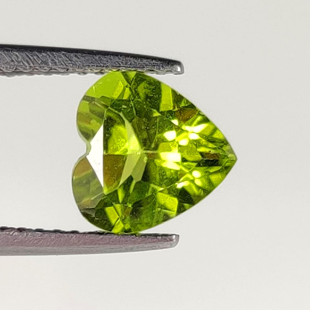 1.58 Ct Natural Green Peridot Heart Cut: Weight - 1.58 Ct / Dimensions - 8.00 x 7.80 x 4.00 mm / Shape - Heart Cut / Color - Green / Clarity - VVS / Origin - Pakistan / Treatment - None