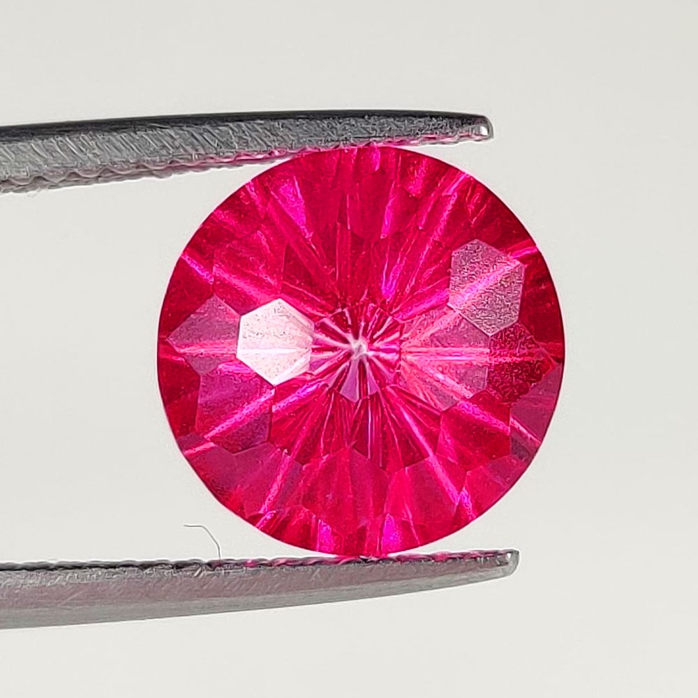 4.74 Ct Natural Pink Topaz Round Football Cut: Weight - 4.74 Ct / Dimensions - 10.00 x 10.00 x 6.80 mm / Shape - Round Football Cut / Color - Pink / Clarity - VVS / Origin - Brazil / Treatment - Color Coated