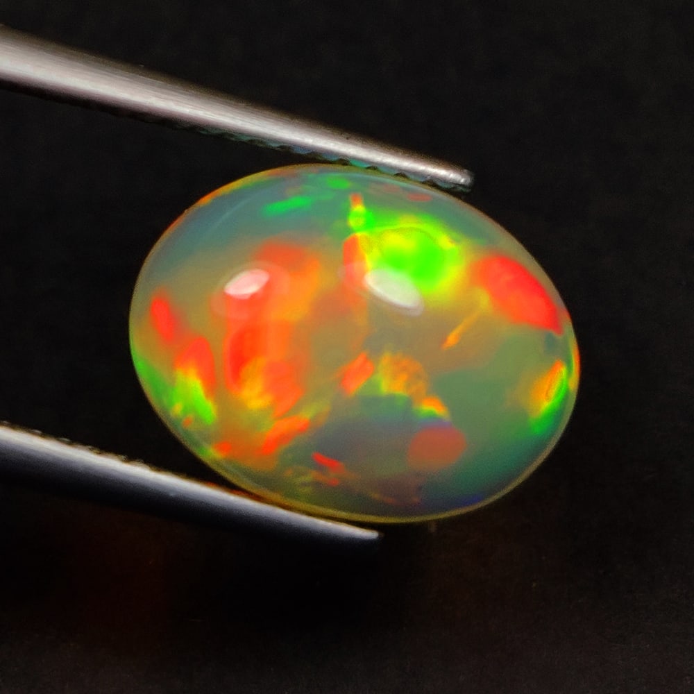 3.58 Ct Natural Multicolor Welo Opal Top Fire Oval Cab (1 of 3)