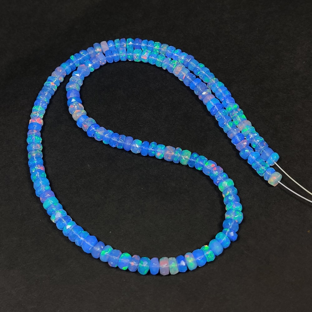 45.56 Ct Natural Blue Fire Opal Round Beads: Weight - 45.56 Ct / Size - 4.50 - 4.80 mm / 154 Pc's / Shape - Round Beads / Color - Blue / Clarity - Translucent / Origin - Ethiopia / Treatment - Color Heated