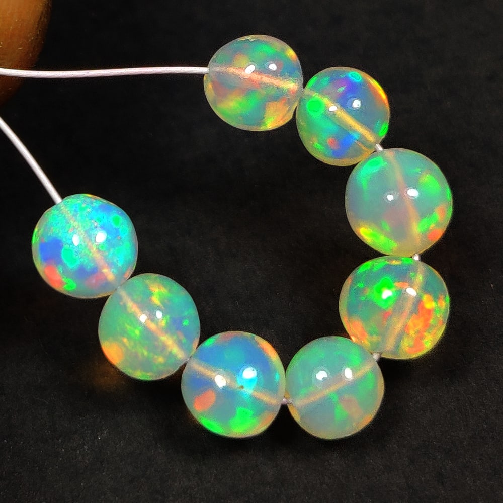 4.35 Ct Natural Multicolor Welo Opal Flash Fire Round Beads (1 of 2)