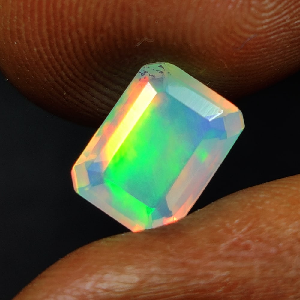 1.08 Ct Natural Multicolor Welo Opal Top Fire Octagon Cut: Weight - 1.08 Ct / Size - 8.10 x 6.10 x 4.20 mm / Shape - Octagon Cut / Color - Multicolor / Clarity - Translucent / Origin - Ethiopia / Treatment - None