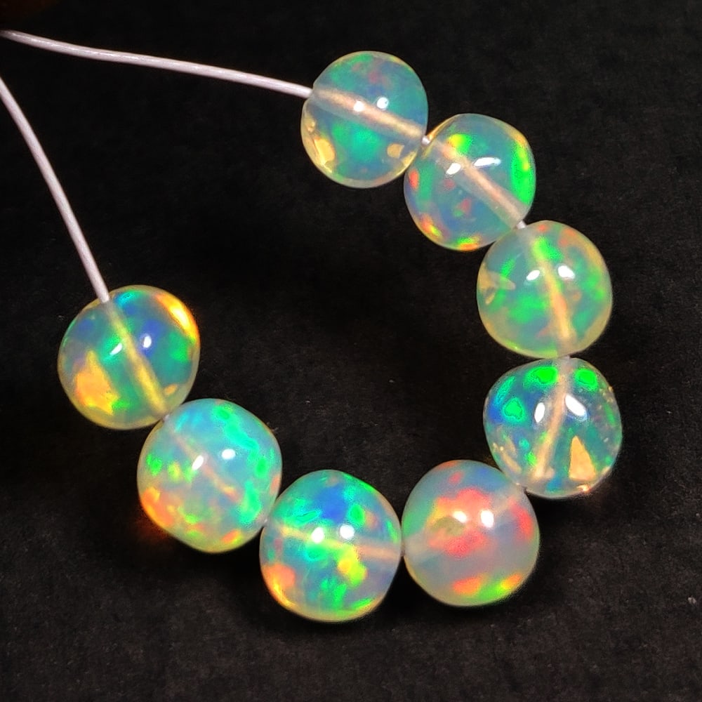 2.84 Ct Natural Multicolor Welo Opal Flash Fire Round Beads: Weight - 2.84 Ct / Dimensions - 4.20 - 4.60 mm / 8 Pc's / Shape & Cut - Drilled Round Beads / Color - Multicolor / Transparency - Translucent / Origin - Ethiopia / Comments - None
