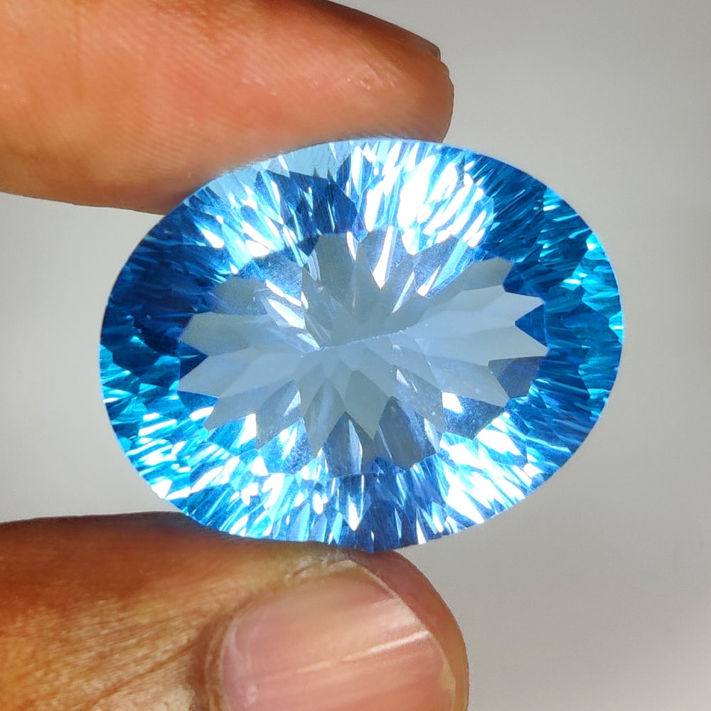 54.35 Ct Natural Swiss Blue Topaz Oval Fancy Cut (1 of 2)