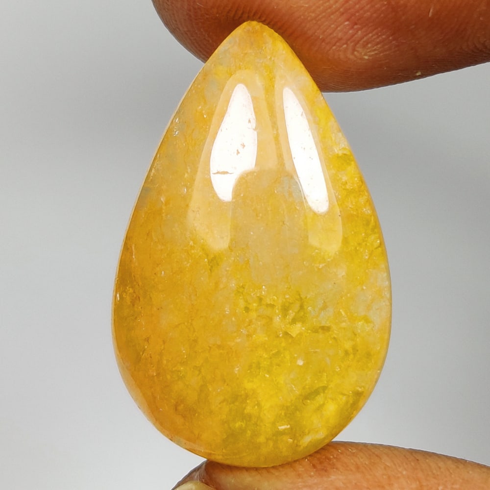 21.12 Ct Natural Aventurine Pear Cab: Weight - 21.12 Ct / Dimensions - 26.00 x 16.60 x 6.60 mm / Shape - Pear Cab / Color - Green / Clarity - VVS / Origin - Brazil / Treatment - None