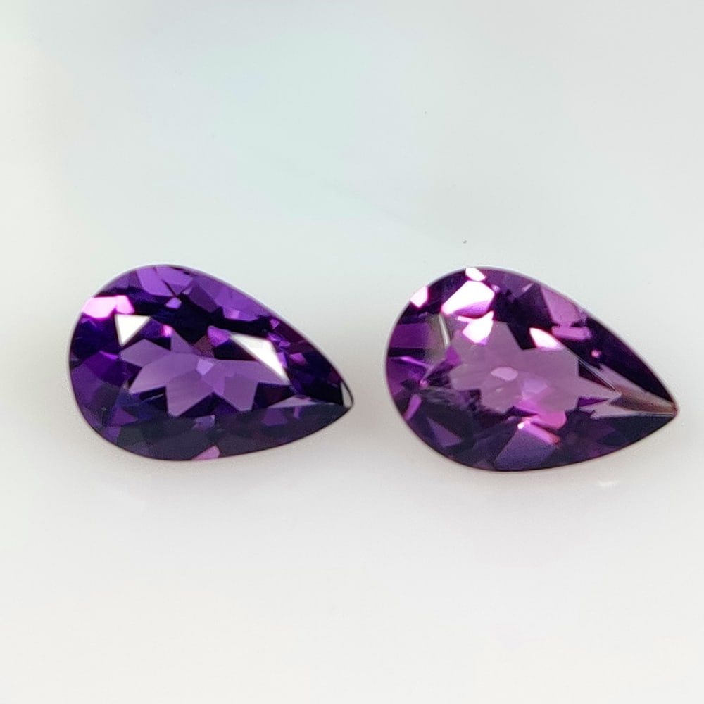5.14 Ct Natural Purple Amethyst Pear Cut Pair: Weight - 5.14 Ct / Size - 12.20 x 8.20 x 5.30 mm / 2 Pc's / Shape - Pear Cut / Color - Purple / Clarity - VVS / Origin - Brazil / Treatment - Heated