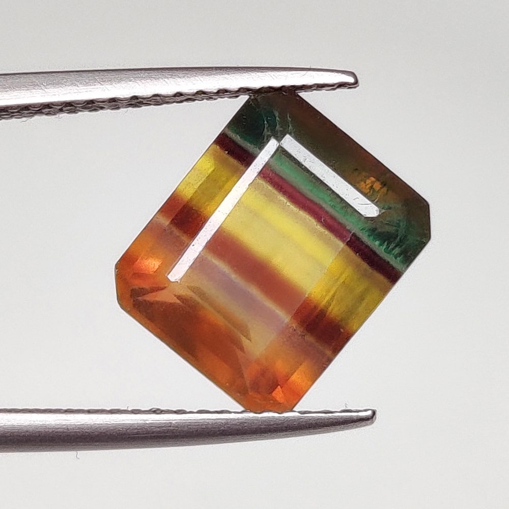 5.54 Ct Natural Multicolor Flourite Emerald Cut: weight - 5.54 Ct / Dimensions - 11.00 x 9.00 x 6.50 mm / Shape - Emerald Cut / Origin - Brazil / Treatment - None
