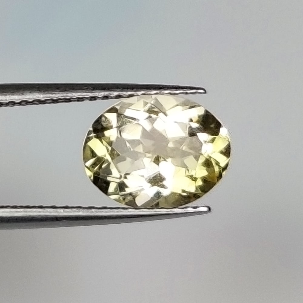 2.10 Ct Natural Yellow Citrine Oval Cut: Weight - 2.10 Ct / Size - 10.00 x 7.80 x 5.10 mm / Shape - Oval Cut / Color - Yellow / Clarity - VVS / Origin - Brazil / Treatment - Heated
