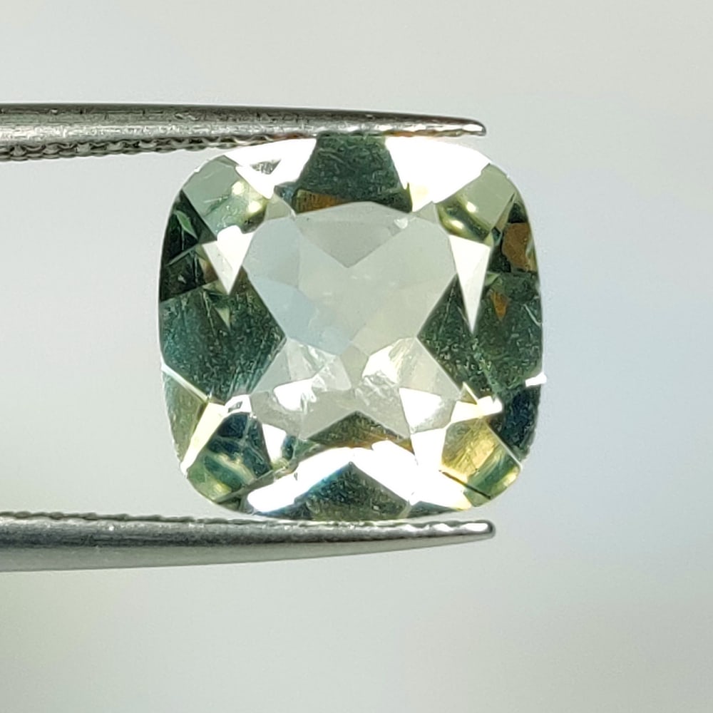 3.44 Ct Natural Green Amethyst Cushion Cut: Weight - 3.44 Ct / Size - 10.10 x 10.00 x 5.70 mm / Shape - Cushion Cut / Color - Green / Clarity - VVS / Origin - Brazil / Treatment - Heated
