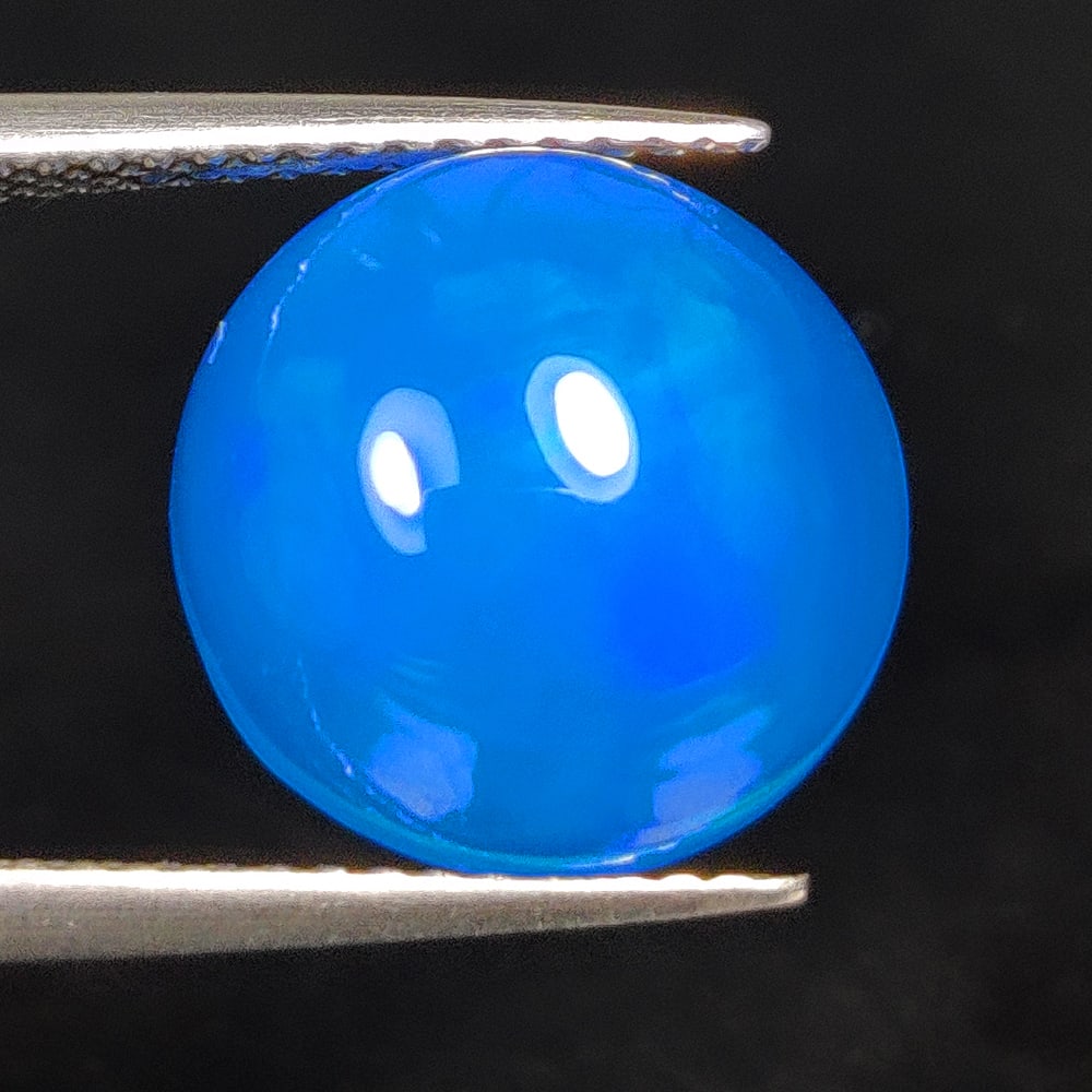 3.82 Ct Natural Blue Fire Opal Round Cab (1 of 2)