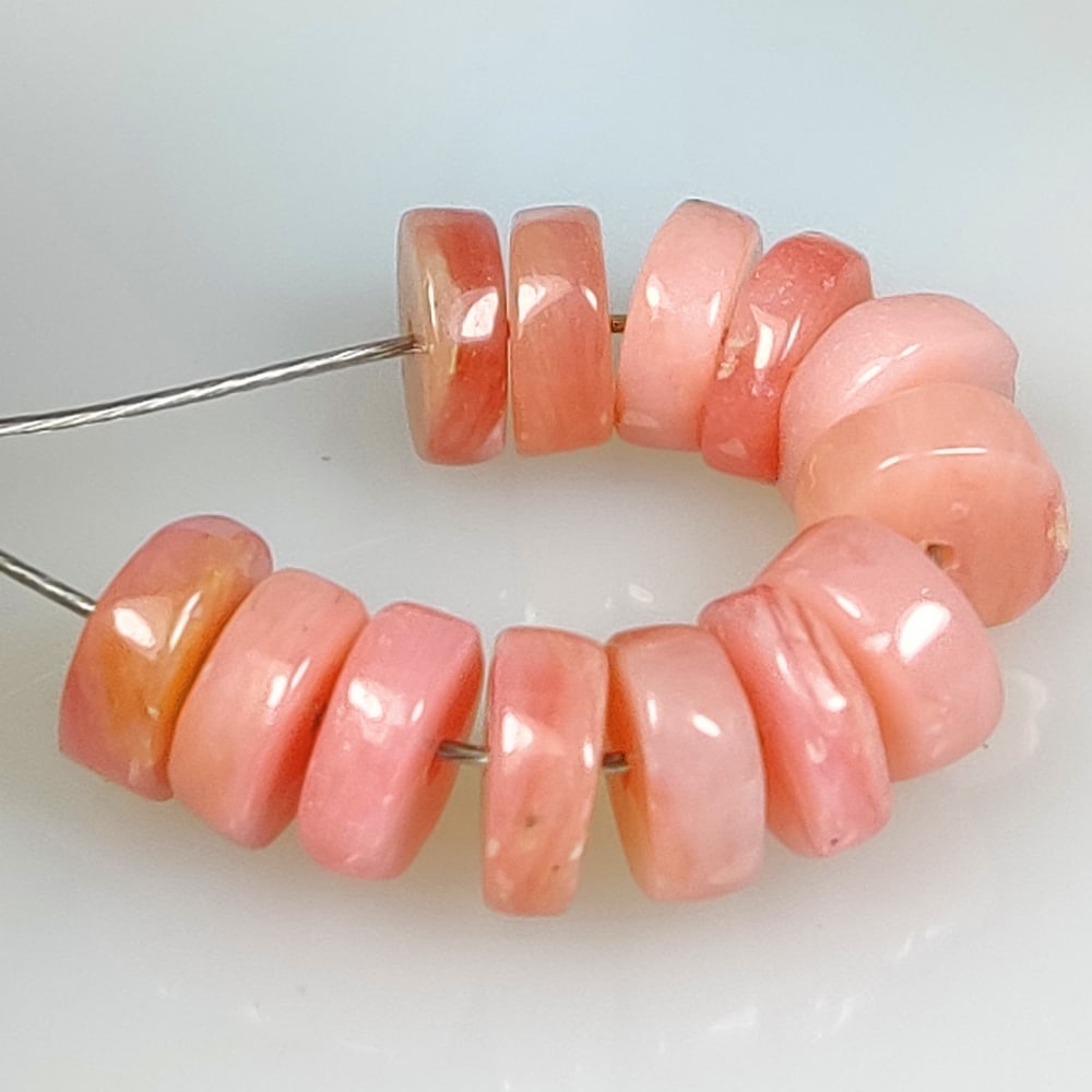 8.42 Ct Natural Pink Opal Round Beads: Weight - 8.42 Ct / Dimensions - 5.90 - 6.30 mm / 13 Pc's / Shape - Round Beads / Clarity - Opaque / Origin - Peru / Treatment - None