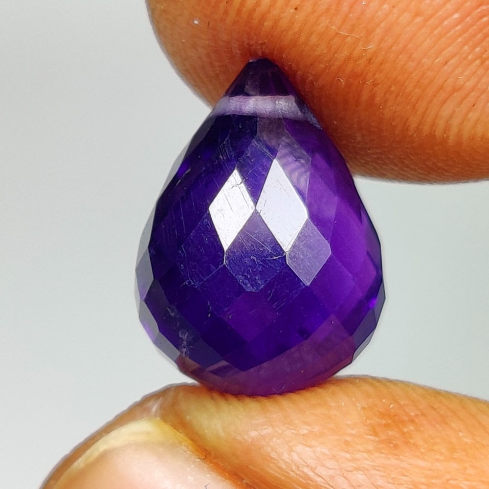 4.79 Ct Natural Purple Amethyst Pear Drop Beads: Weight - 4.79 Ct / Dimensions - 11.60 x 8.50 x 8.50 mm / Shape - Pear Drop Beads / Color - Purple / Clarity - VVS / Origin - Brazil / Treatment - Heated