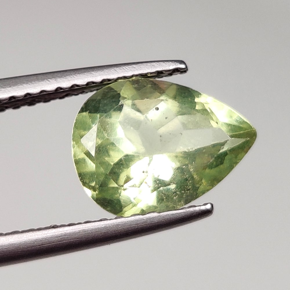 1.85 Ct Natural Green Beryl Pear Cut: Weight - 1.85 Ct / Dimensions - 10.00 x 7.60 x 5.20 mm / Shape - Pear Cut / Clarity - VVS / Origin - Brazil / Treatment - Heated