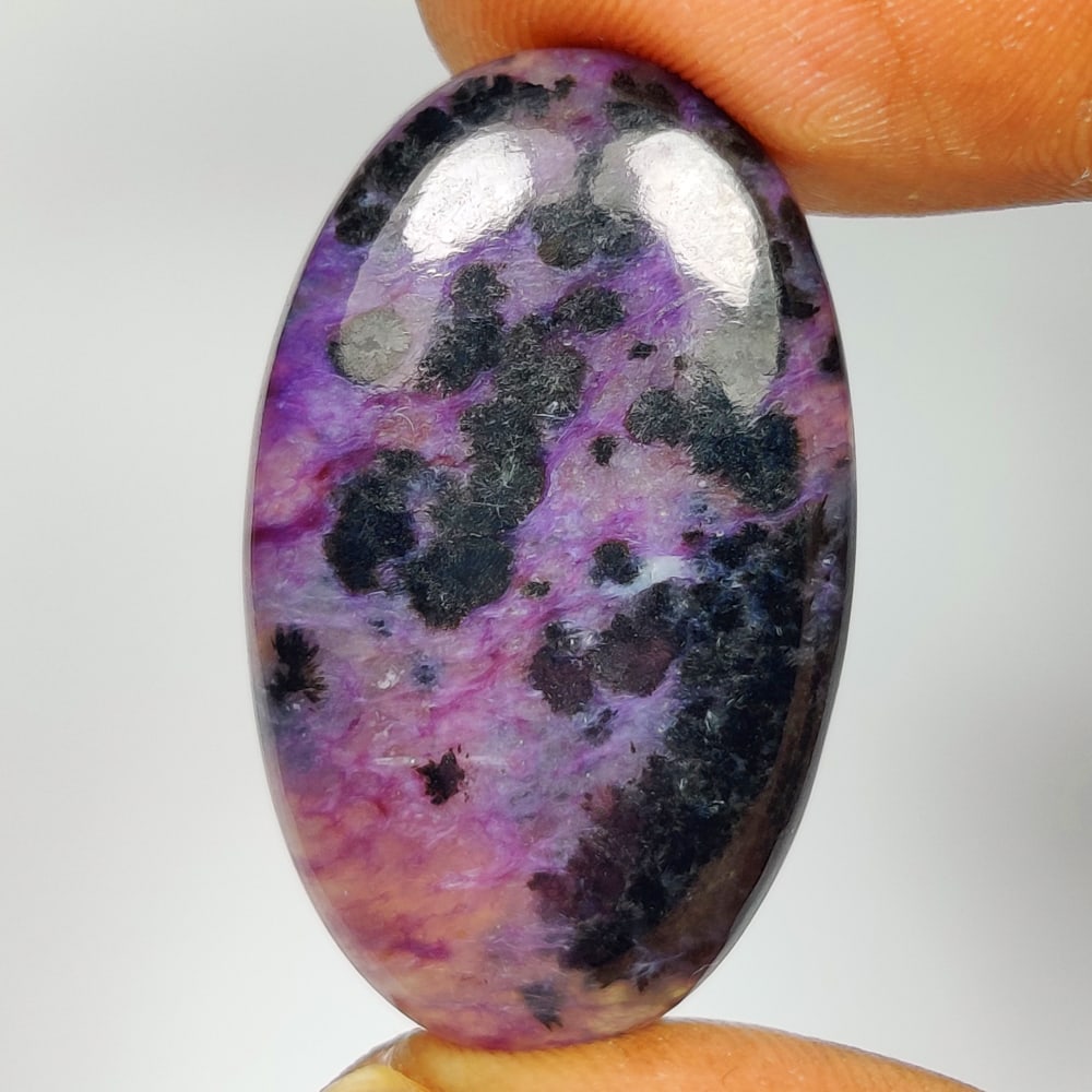 26.00 Ct Natural Purple Charoite Oval Cab: Weight - 26.00 Ct / Size - 30.00 x 18.50 x 5.20 mm / Shape - Excellent Oval Cab / Clarity - Opaque / Origin - Brazil / Treatment - None